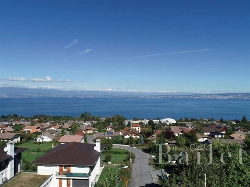 Charming T4 of 99.72 m² on the 2nd floor of a residence located in a residential area of Evian.