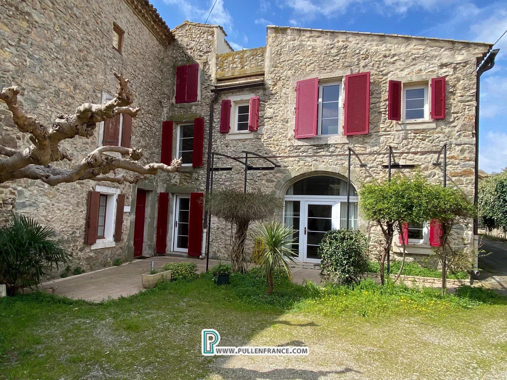 Atypical village house with gite and roof terraces in Minervois canalside village