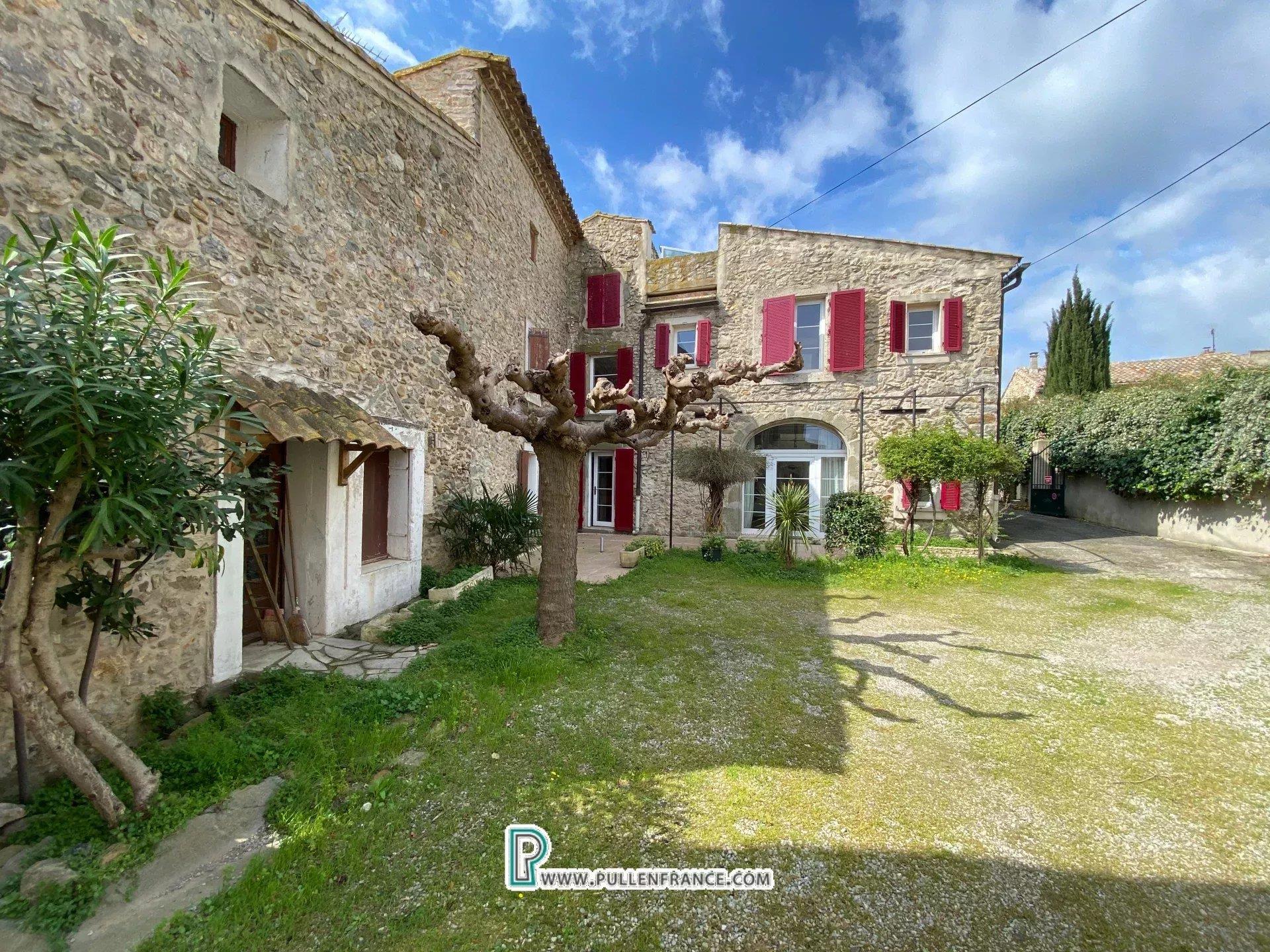 Atypical village house with gite and roof terraces in Minervois canalside village