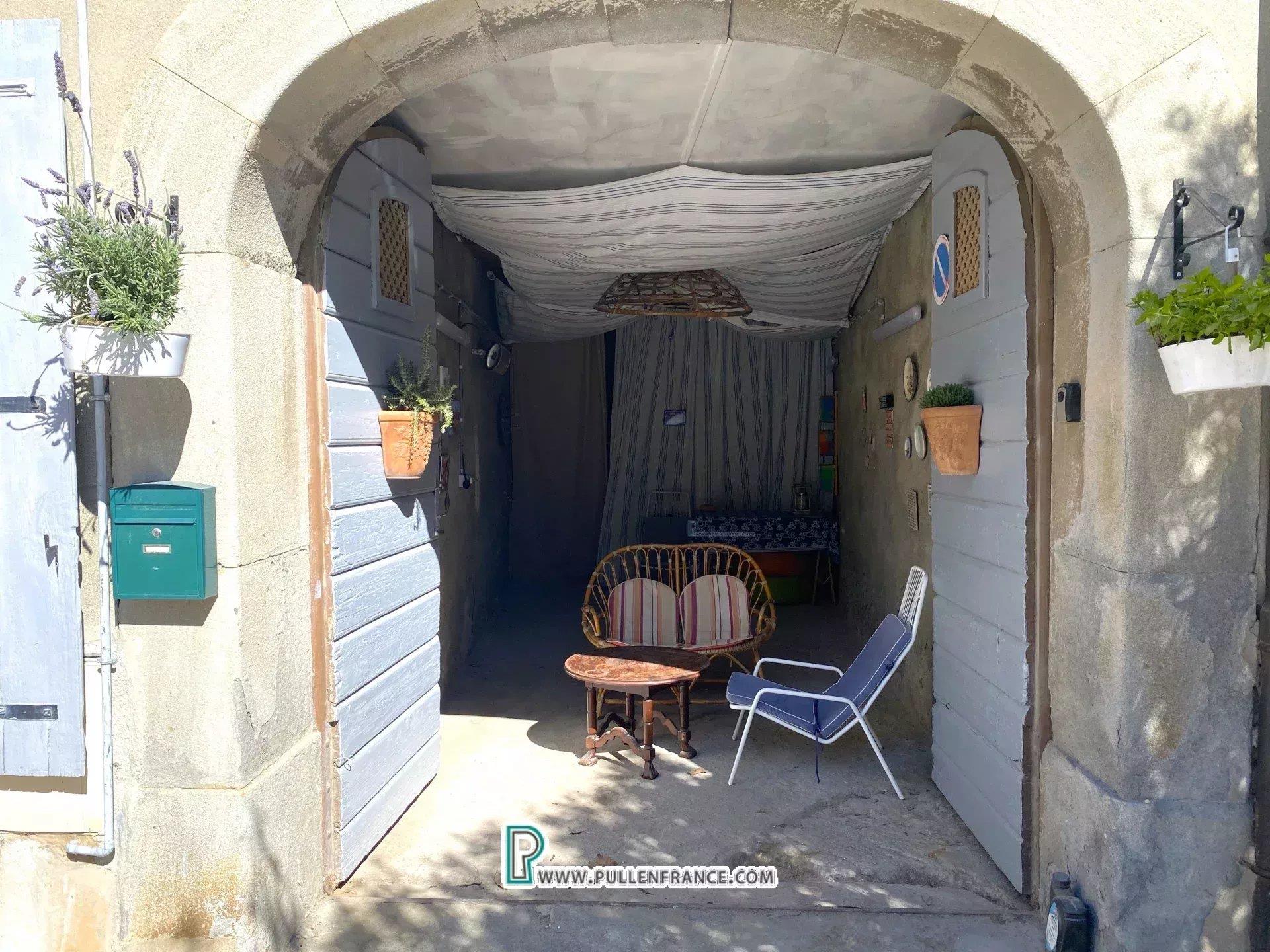 Impressive partly renovated village house with garage in Minervois village