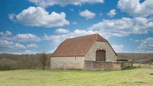 Beautiful barn of 110 m² per level with a large plot of 8000m
