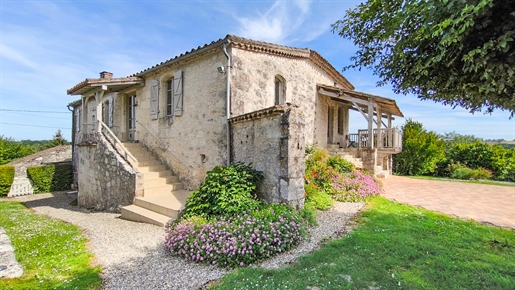 Stone house of approx. 150 m2 and its 2 stone outbuildings with swimming pool on a plot of 12,333 m2