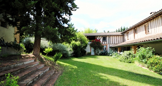 Authentic Old Farmhouse with Large Outbuildings, wooded and flowered grounds on 3.16 ha of land