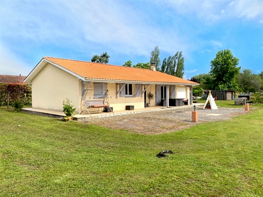 À 3 km de Landiras, Pavillon de 100 m2 avec trois chambres et garage sur 5000 m2.