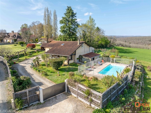 Charmante propriété avec piscine, jardin et garage.