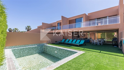 Luxury townhouse with pool in prestigious private golf compl