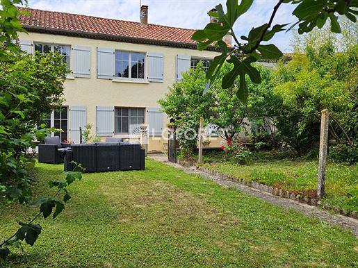 Village house with garden and garage