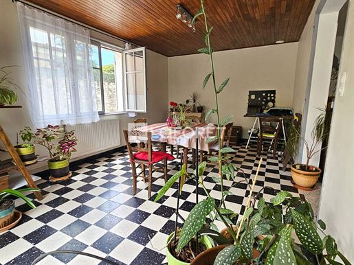 Village house with garden and garage