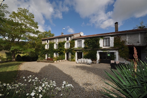 Beautiful property with swimming pool and outbuildings on approximately 4.8 ha