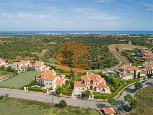 Lote de terreno com 2474m2 para construção de moradia isolada com 500 m2no Golfe Monte Rei