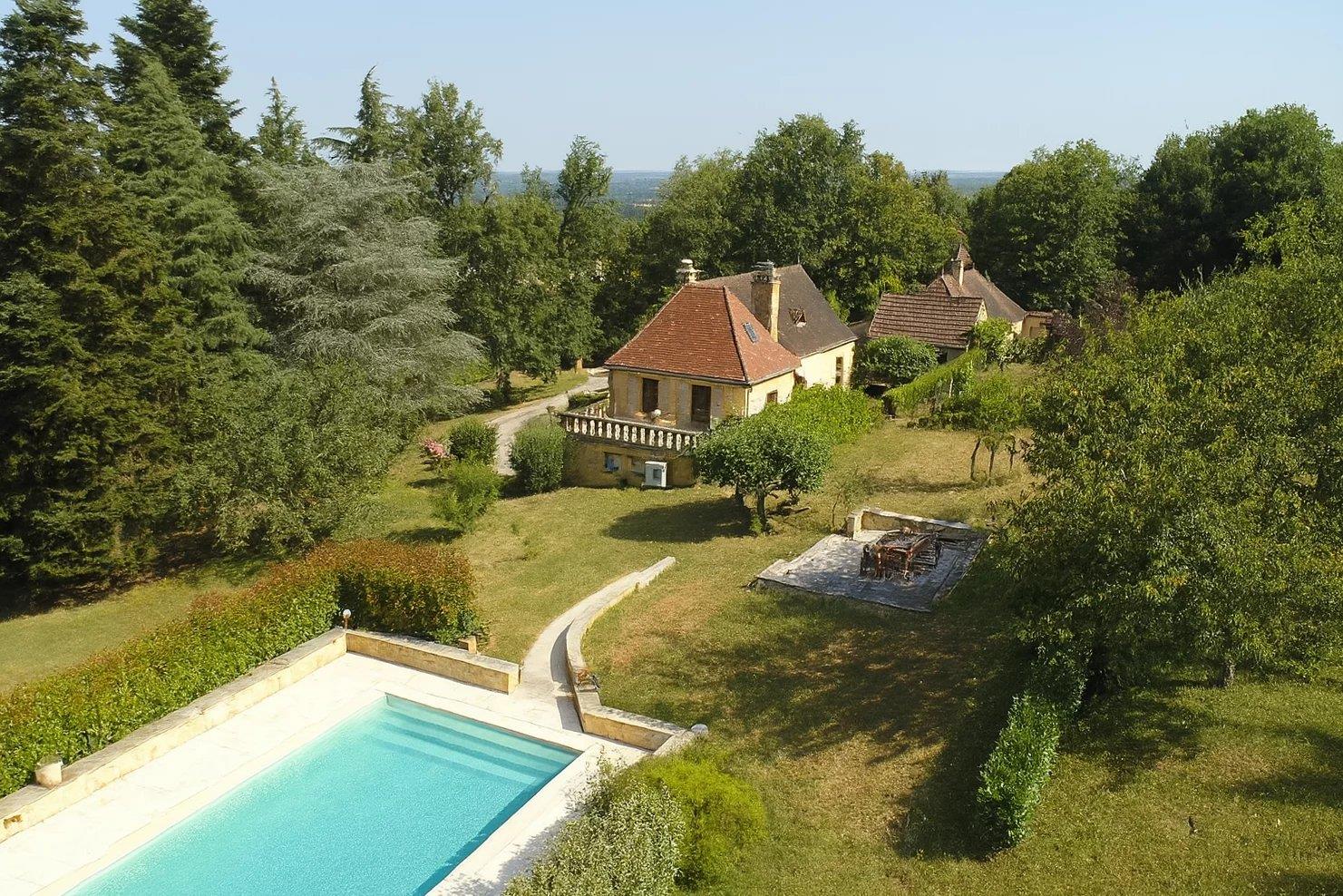 Charming property with independent guesthouse, heated swimming pool, and wooded park