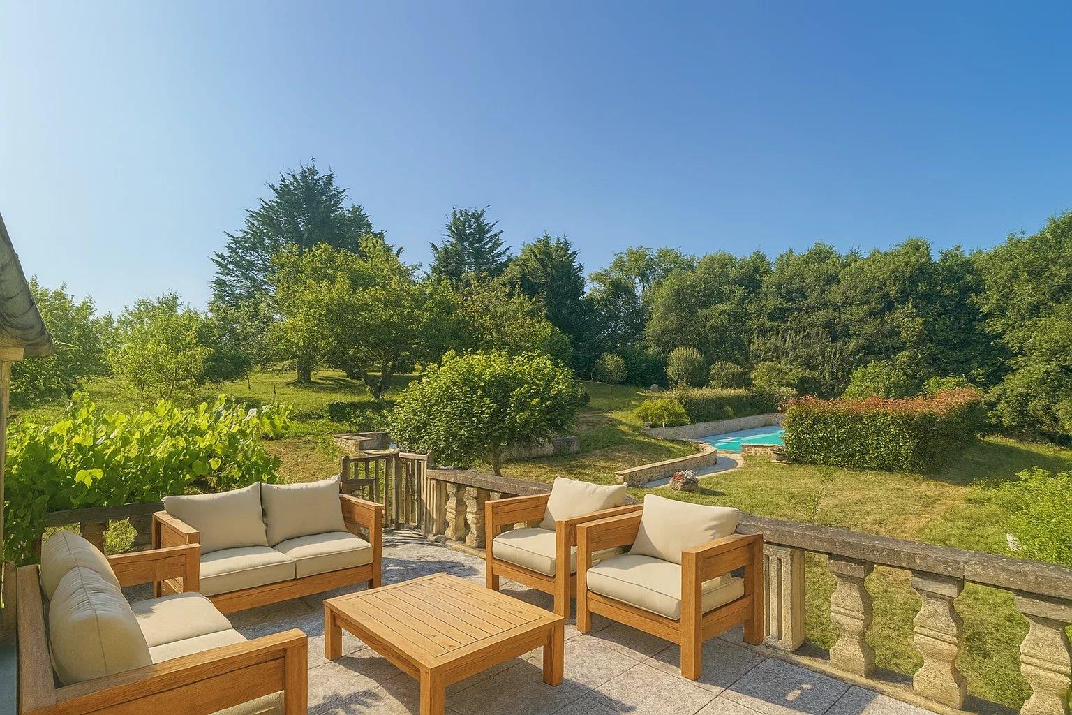 Charming property with independent guesthouse, heated swimming pool, and wooded park