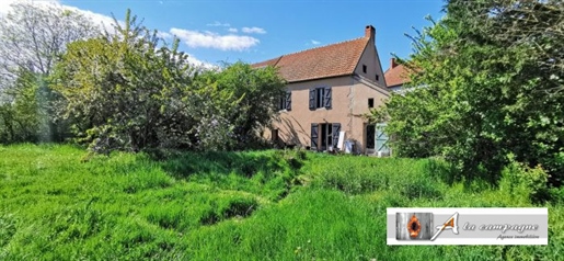 Detached family house with more than 3500m² in a lovely village