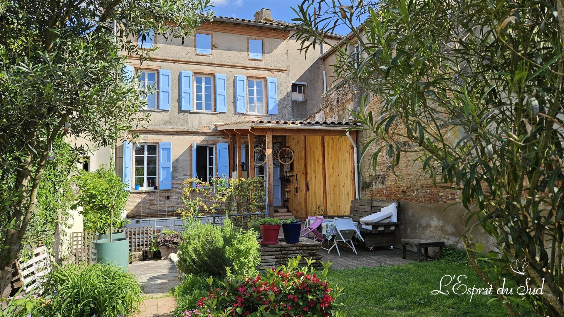 Bourgeois house, garden, and covered terrace