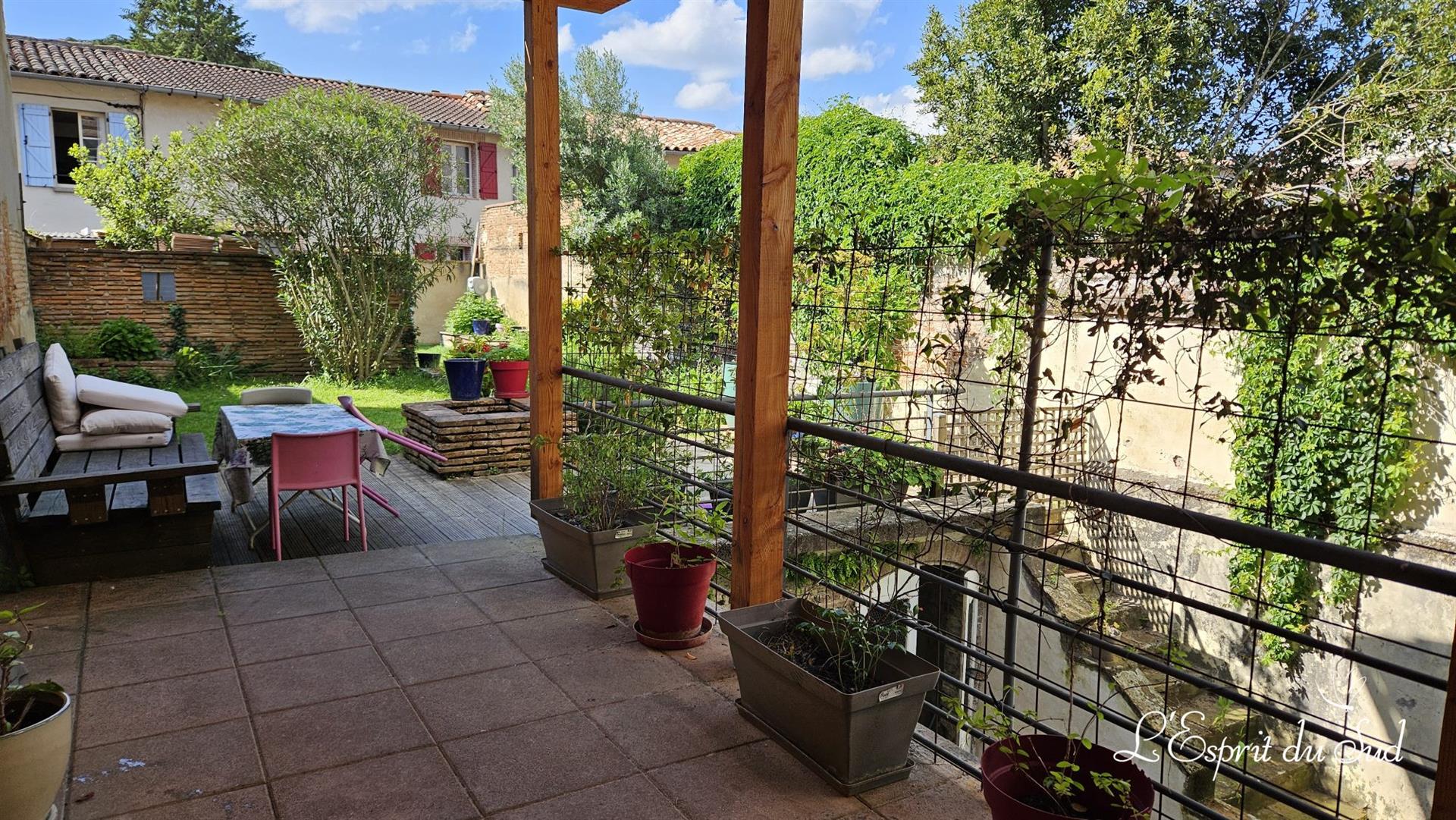 Bourgeois house, garden, and covered terrace