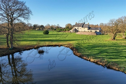 Реновирано имение от 17-ти век с басейн и езерце в сърцето на парк от 3 хектара