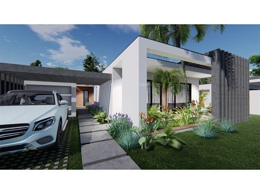 Detached house T4 new, in plant, inserted in a plot of 1250m2, with luxury finishes. -Aroeira