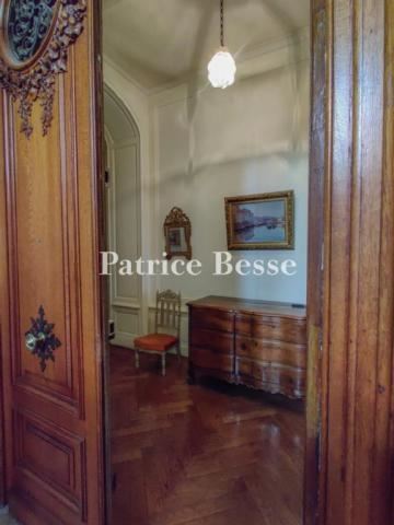 An early 20th century flat and its terrace in a mansion house on the edge of Lyon's Tête-d'Or Park.