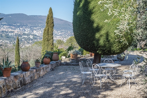 This elegant 17th century bastide sitting in wonderful dominant position on its private landscaped a