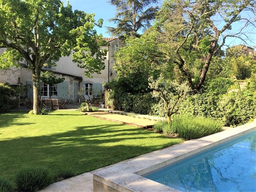 Rare in Lourmarin! In the heart of the village, charming old house set in 440 m2 of land decorated w