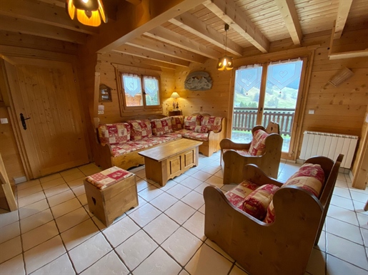 This magnificent chalet is peacefully nestled in a lush green setting between the Les Saisies ski re