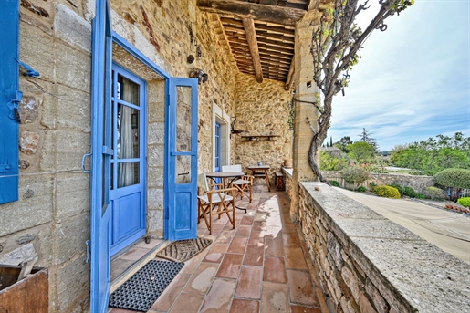 In a quiet area without being out of the way, about fifteen minutes from Uzes, property comprising a