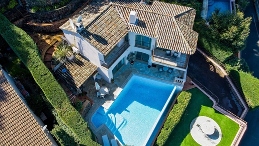 Provencal villa built on 3 levels enjoying a panoramic sea view over the entire bay of Theoule and C