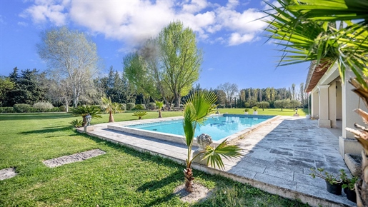 Discreetly positioned at the end of a driveway lined with olive trees, cypresses and oleander this a