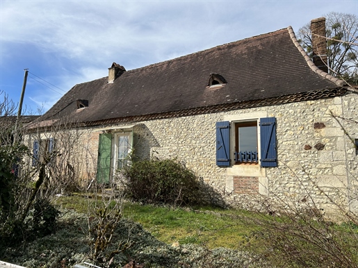 Propriété de deux maisons en pierre avec terrain a diviser constructible 8800m2